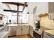 Modern kitchen with white cabinets and marble countertops at 630 N College Ave # 401, Indianapolis, IN 46204