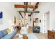 Open concept living area with stylish furniture and a view of the kitchen at 630 N College Ave # 401, Indianapolis, IN 46204