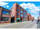 Brick building on a city street with green space at 630 N College Ave # 401, Indianapolis, IN 46204