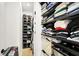 Large walk-in closet with ample shelving and storage space for shoes and clothes at 630 N College Ave # 401, Indianapolis, IN 46204