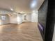 Spacious living room featuring an electric fireplace, recessed lighting, and light-colored walls at 6775 N County Road 550 E, Brownsburg, IN 46112