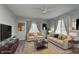 A spacious living room featuring hardwood floors, neutral decor and plenty of natural light at 711 W 24Th St, Anderson, IN 46016