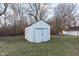 Shed featuring white wood and double doors in the yard at 711 W 24Th St, Anderson, IN 46016