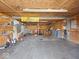 Oversized garage with concrete floor and various tools at 7279 W State Road 44, Shelbyville, IN 46176