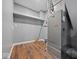 Laundry area with shelving and a new Bryant furnace at 7279 W State Road 44, Shelbyville, IN 46176