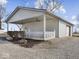 Spacious workshop with ample storage shelving and workbench at 7279 W State Road 44, Shelbyville, IN 46176