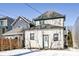 This house features a charming back exterior design with a simple door and easy access for entry at 747 E Mccarty St, Indianapolis, IN 46203