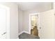 Cozy bedroom featuring plush gray carpeting and an ensuite bathroom for added convenience at 747 E Mccarty St, Indianapolis, IN 46203