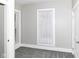 Cozy bedroom features a window with natural light and carpet at 747 E Mccarty St, Indianapolis, IN 46203