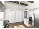 Modern kitchen showcases stainless steel fridge and ample cabinet space at 747 E Mccarty St, Indianapolis, IN 46203