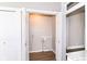 Laundry room offers convenient hookups and storage at 747 E Mccarty St, Indianapolis, IN 46203