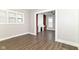 Open living space with wood floors and built-in bookshelves at 747 E Mccarty St, Indianapolis, IN 46203