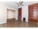 Bright living room featuring built-in shelves, fireplace and wood-look floors with lots of natural light at 747 E Mccarty St, Indianapolis, IN 46203