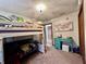 Cozy bedroom featuring bunk bed and a decorative desk with an accent map at 1072 S State Road 67, Martinsville, IN 46151