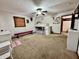 Spacious bedroom with a ceiling fan, bunk bed, window and ample space for play and relaxation at 1072 S State Road 67, Martinsville, IN 46151