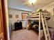 Bright bedroom featuring a bunk bed, dresser, and window with blinds at 1072 S State Road 67, Martinsville, IN 46151
