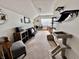 Spacious bonus room with seating area and lots of natural light, ideal for recreation and relaxing at 1072 S State Road 67, Martinsville, IN 46151