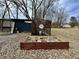 Backyard chicken coop structure and raised garden bed surrounded by bare trees at 1072 S State Road 67, Martinsville, IN 46151