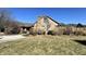 Large brick home featuring a chimney and a gable roof, surrounded by natural landscaping at 1072 S State Road 67, Martinsville, IN 46151