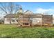 Wide open back yard with a privacy fence, grass, and trees around perimeter at 12525 Wolford Dr, Fishers, IN 46038