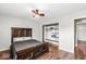 Bedroom featuring a bed and open closet with shelves at 12525 Wolford Dr, Fishers, IN 46038