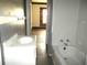 A compact bathroom showcasing a tub, shower, and modern sink fixture at 1258 W 29Th St, Indianapolis, IN 46208