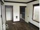 A bedroom featuring original hardwood floors and a walk-in closet, offering plenty of storage at 1258 W 29Th St, Indianapolis, IN 46208