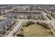 Aerial view of colorful townhomes and manicured green space in a quiet, well-planned community at 12755 Forsyth St, Carmel, IN 46032
