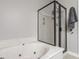 Modern bathroom featuring a soaking tub and frameless glass shower at 12755 Forsyth St, Carmel, IN 46032
