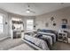 bedroom with a desk, shelving, and a comfortable bed, creating a cozy and organized space at 12755 Forsyth St, Carmel, IN 46032