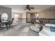 Upstairs loft with a cozy sitting area and desk, featuring neutral carpet and overhead lighting at 12755 Forsyth St, Carmel, IN 46032