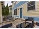 Cozy outdoor patio with wicker furniture and a grill, perfect for relaxing and entertaining at 12755 Forsyth St, Carmel, IN 46032