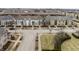 Charming colorful townhomes with inviting front porches and well-maintained street view at 12755 Forsyth St, Carmel, IN 46032