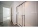 Bathroom with tiled shower stall, glass door and modern fixtures at 1407 Foxtail Ln, Greenwood, IN 46143