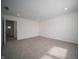 Comfortable bedroom with neutral carpet, bright with natural light and ensuite access at 1407 Foxtail Ln, Greenwood, IN 46143
