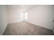 Bedroom with neutral carpeting, creating a bright and inviting space at 1407 Foxtail Ln, Greenwood, IN 46143