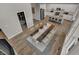 Open concept kitchen flowing into dining room and offering a view of wine storage at 15377 Manderley St, Fishers, IN 46040