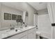 Bright bathroom featuring a double sink vanity and modern fixtures at 16923 Sandhurst Pl, Westfield, IN 46074