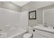 Bathroom featuring a tub, shower, toilet, sink, and grey walls at 16923 Sandhurst Pl, Westfield, IN 46074