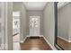Inviting entryway with wood flooring and views to the outside at 16923 Sandhurst Pl, Westfield, IN 46074