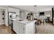 Spacious kitchen featuring a center island, stainless steel appliances, granite countertops, and hardwood floors at 16923 Sandhurst Pl, Westfield, IN 46074