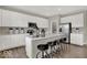 Well-appointed kitchen with a center island, stainless steel appliances, a pantry, and plenty of cabinet space at 16923 Sandhurst Pl, Westfield, IN 46074