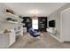 Bright and airy bonus room with a study area and cozy chairs at 16960 Sandhurst Pl, Westfield, IN 46074