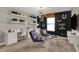 Inviting bonus room complete with study area and comfortable seating at 16960 Sandhurst Pl, Westfield, IN 46074