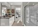 Contemporary bathroom with double sinks, spacious countertop, modern fixtures, and glass-enclosed shower at 16966 Sandhurst Pl, Westfield, IN 46074
