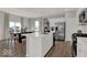 Bright, open kitchen and dining area with stainless steel appliances and ample counter space at 16966 Sandhurst Pl, Westfield, IN 46074