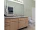 Large bathroom with wide mirror and lots of drawer space at 2231 Colfax Ln, Indianapolis, IN 46260
