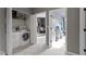 Hallway featuring a laundry room with washer and dryer at 2231 Colfax Ln, Indianapolis, IN 46260