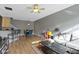 Spacious living room and dining area with wood floors and open layout at 2231 Colfax Ln, Indianapolis, IN 46260
