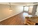 Open living space showcasing wood floors, modern lighting, and natural light at 2231 Colfax Ln, Indianapolis, IN 46260